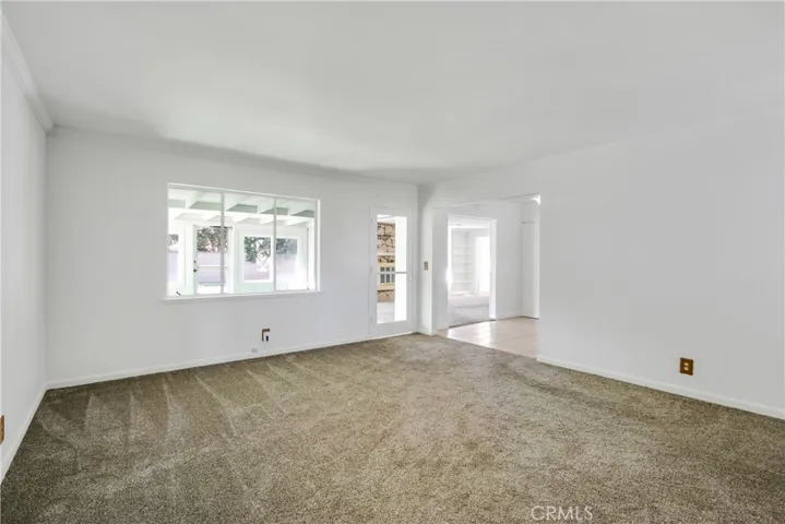 Open Floorplan- Living Room looking toward Family Room and Dining Room