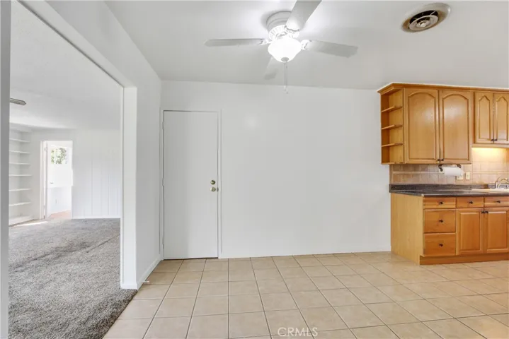 Dining Room Situated between the Living Room and Family Room