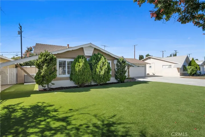 Easy upkeep - artificial grass in the front yard!