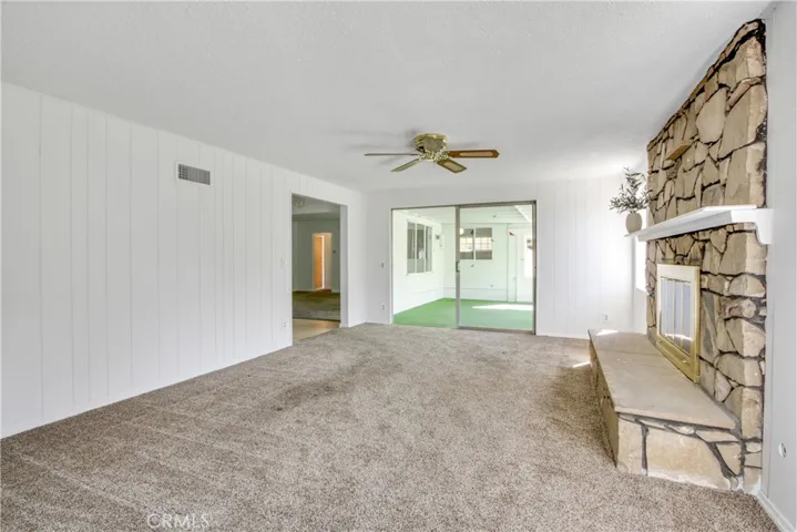 Family Room connects to the enclosed patio