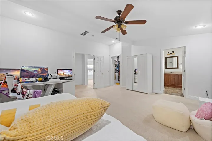 Master bedroom with private en suite and large walk-in closet.