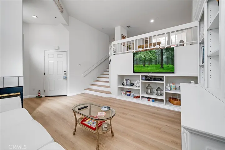 Cozy gas fireplace to the left