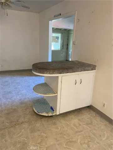 Looking back towards front door from kitchen
