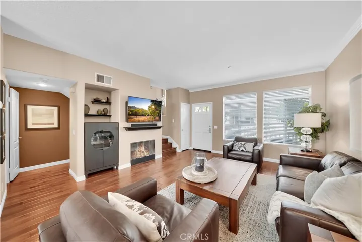 Living room, direct garage access, power room