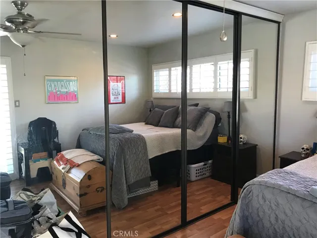 Mirrored wardrobe closet  in main bedroom