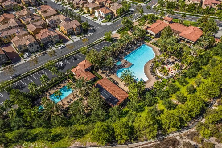 Another view of the sparkling pools, clubhouse and splash pad at The Grove!
