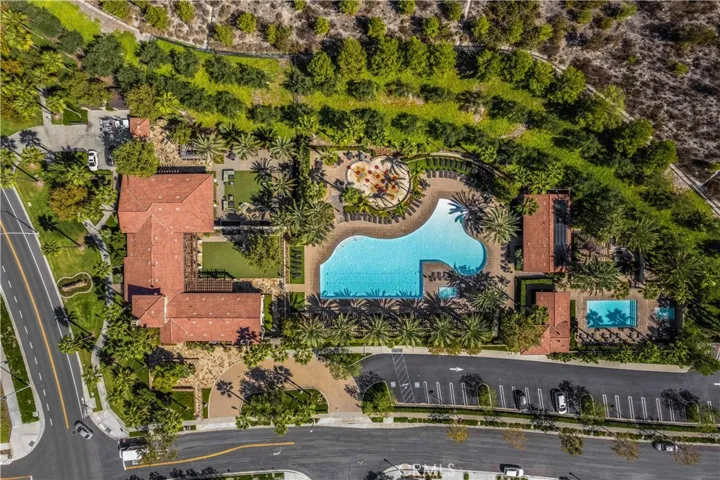 The Grove Clubhouse! This exclusive community resort-style recreation center offers the perfect place to meet up with neighbors and friends. You can relax by the quiet pool and spa or spend the day playing at the splash garden or enjoying the family pool.