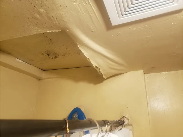 2107 damaged ceiling in bathroom