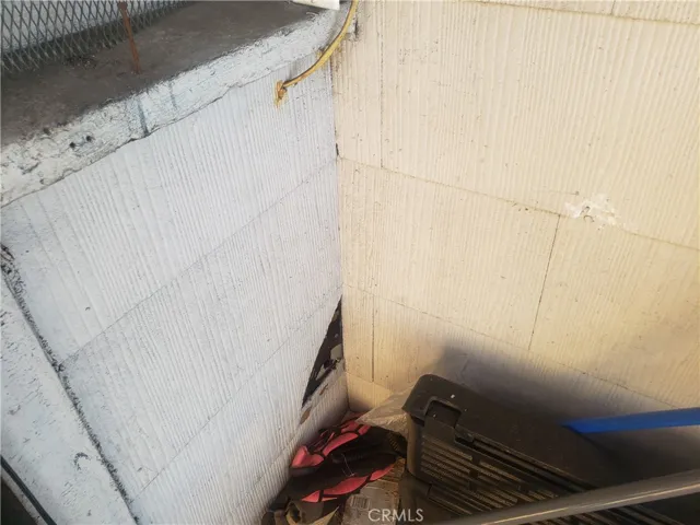 2109 damaged siding back entrance
