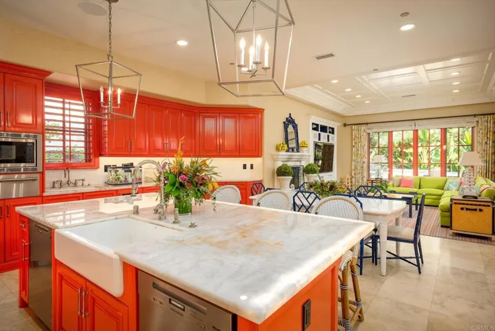 Quartzite counters w/ custom backlighting in island. Waterstone fixtures, scullery sinks, profession