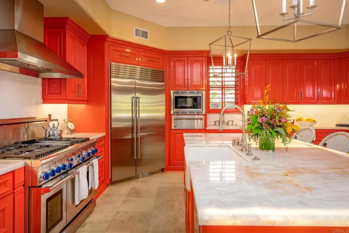 Subzero refrigeration, 2 Miele dishwashers, 48" Thermador prof range. Custom cabinets & hardware
