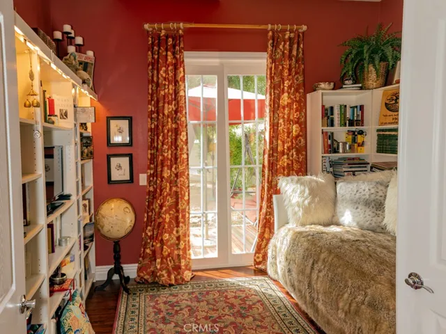 DEN/LIBRARY WITH SLIDING DOOR LEADING TO REAR YARD