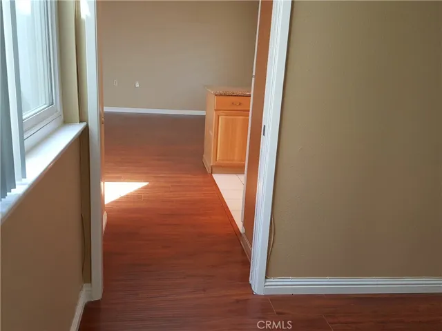 From the guest bedroom hallway to living.