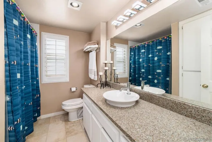 Full bath with tub and shower, linen closet too