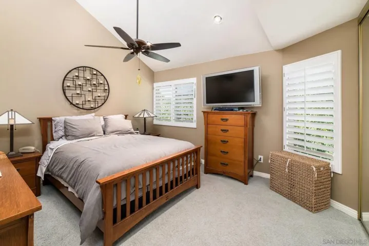 Master bedroom has vaulted ceilings