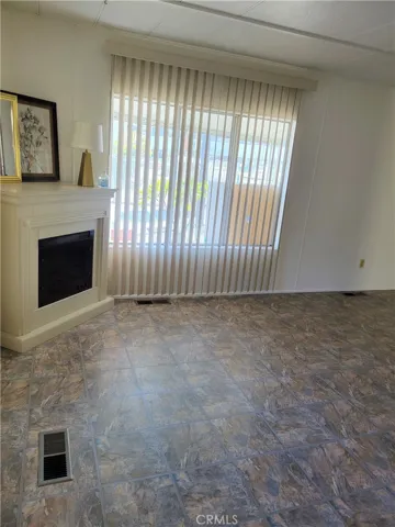 Living Room with Corner Chimney