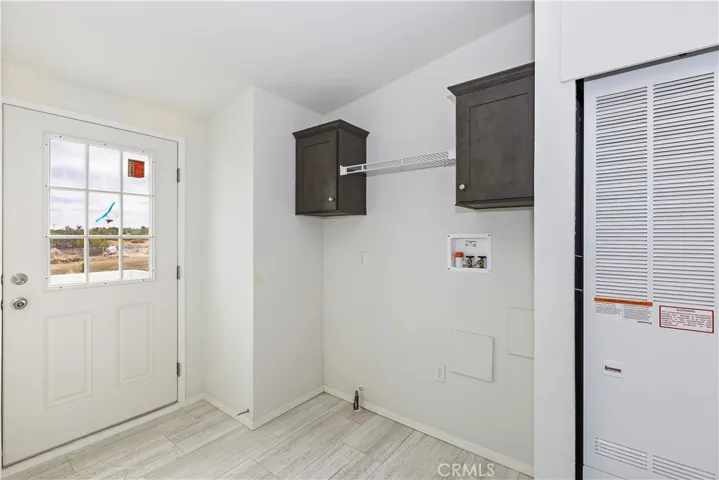 Laundry with Built-in Cabinets