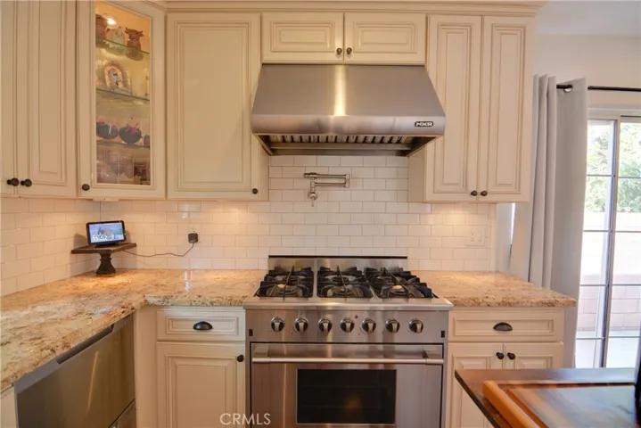 High end 6 burner stove and pot filler