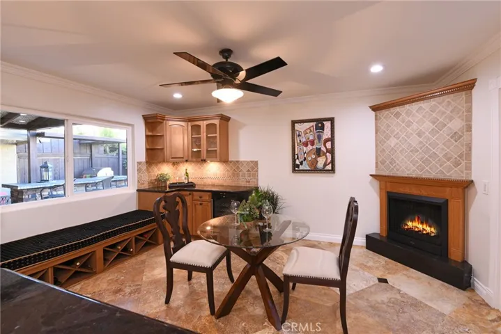 For the wine aficionado, wine storage underneath built in bench seating and a wine fridge.