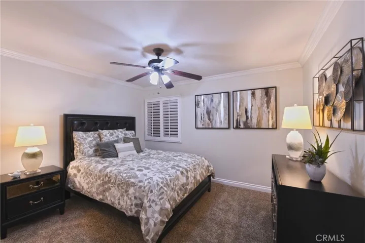 Down the hall are two spacious secondary bedrooms...