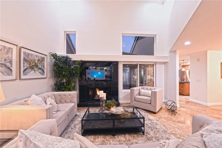 Living room with soaring vaulted ceilings.