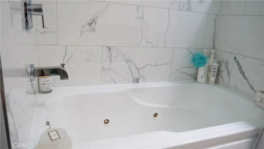 Jacuzzi jetted shower and tub combo