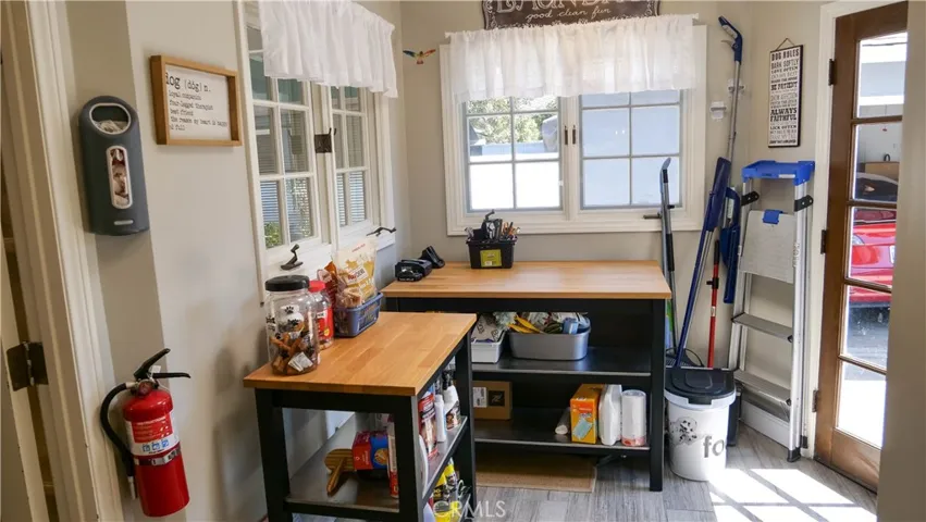 Laundry room and work area off kitchen area