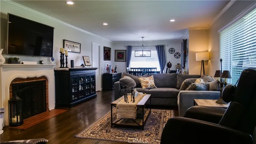 Living Room view and includes a romantic fireplace