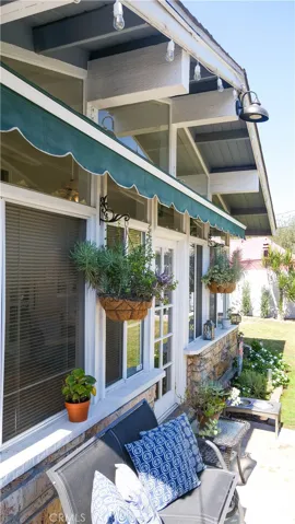 Electronically controlled awning helps to cut down on the summer heat.