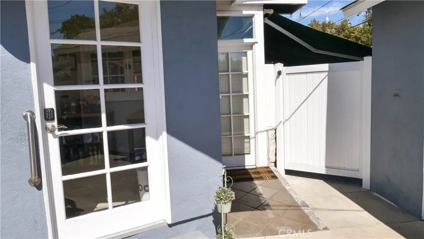 Back door to the house and locking gate.