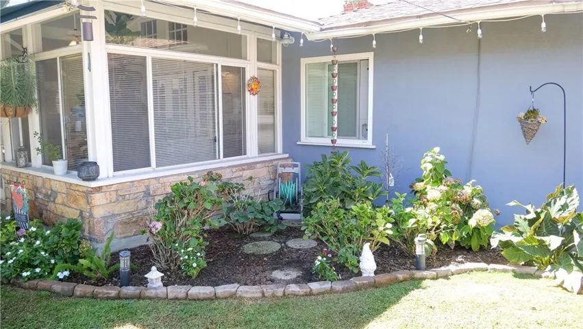 Lots of flowers and plants add to the magic of this yard!