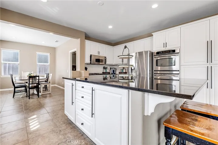 There is plenty of kitchen cabinet storage.  Double ovens and gas cook top.