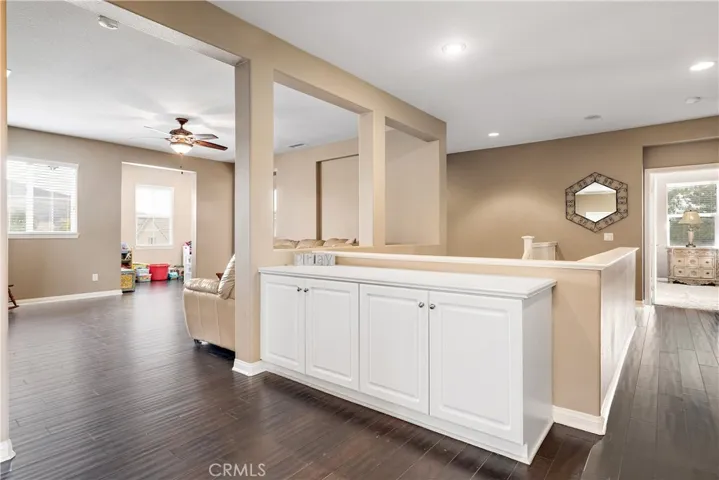 Entry way to bonus room and extra office or craft room.  In addition there is a large nook for a in home gym or toy room.
