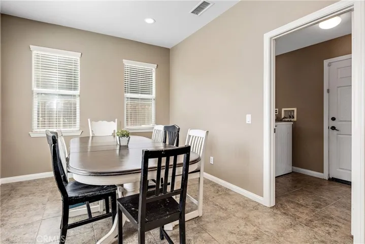 Large dining area.  Laundry room is to the right which leads to the four car garage.