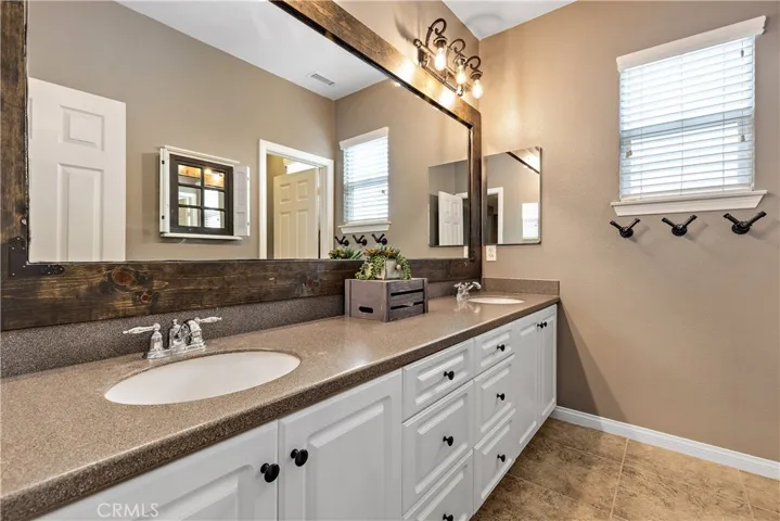 Upstairs dual sink vanity for the three bedrooms