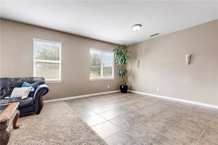 Lots of room for a grand piano, dining room table, or play area.
