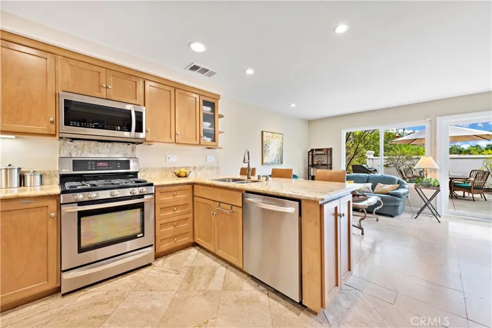 Kitchen opens to Family Room