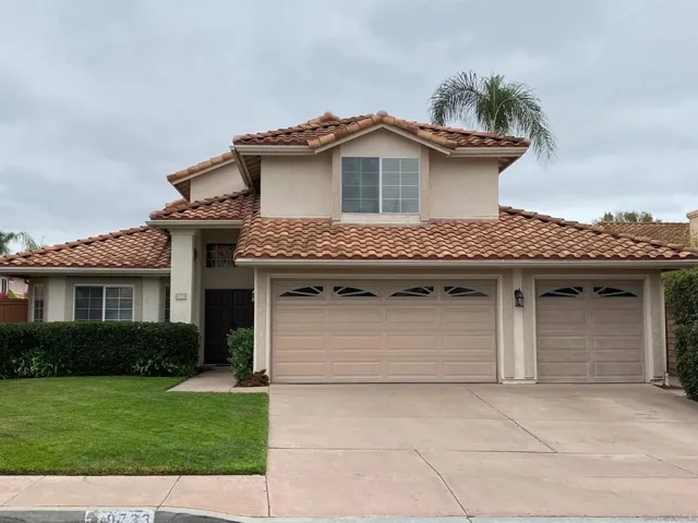 Lovely landscaping, tile roof, 3 car garage, 25' driveway (room to park toys)