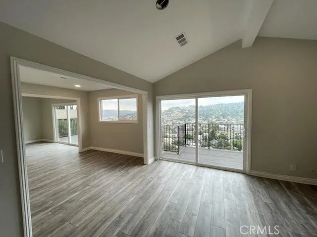 LIVING/FAMILY ROOM LOOKING OUT TO TERRACE