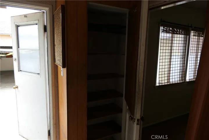 Back of kitchen, back door left, bedroom 3 right