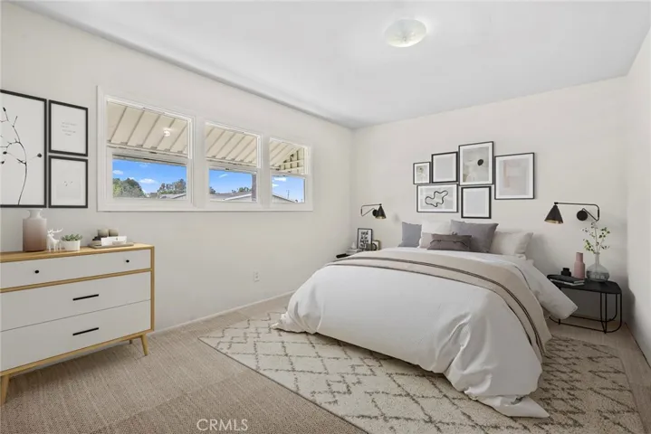 Primary bedroom is virtually staged.