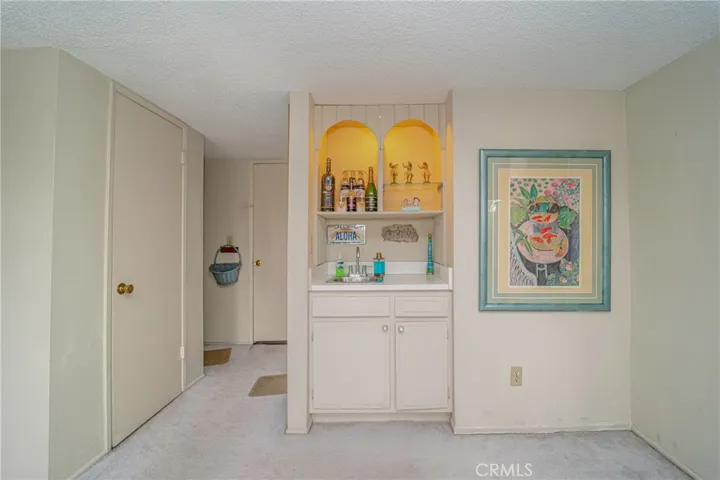 Wet bar in family room and direct access to garage