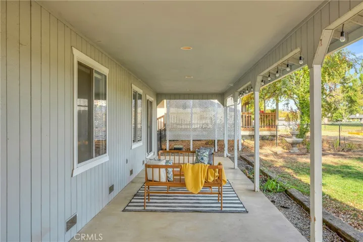 Covered back porch with recessed lighting