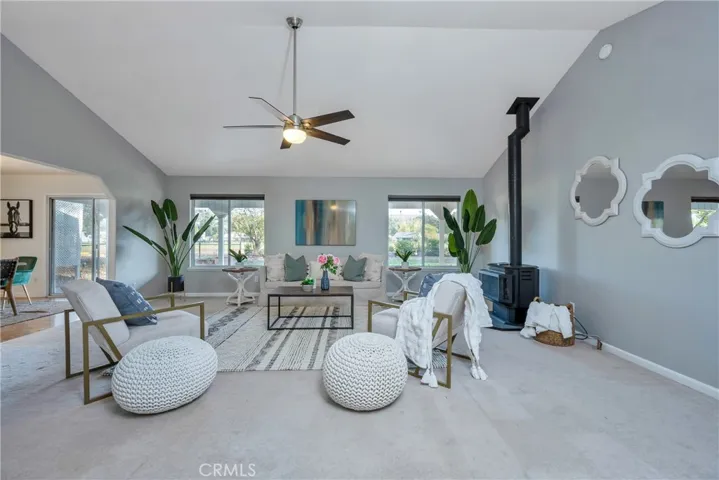 Open floor plan vaulted ceilings with picture windows