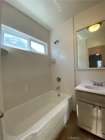 BATHROOM WITH SUBWAY  TILE