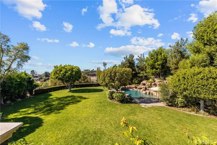 This yard has amusement park quality outside speaker system with 3 underground sub-woofers.