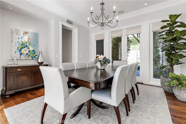 Formal dining room with french doors.