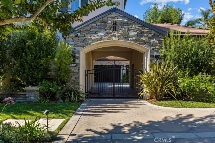 Automatic gate to garage area.