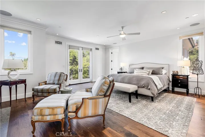 Master bedroom suite with french doors over looking yard.