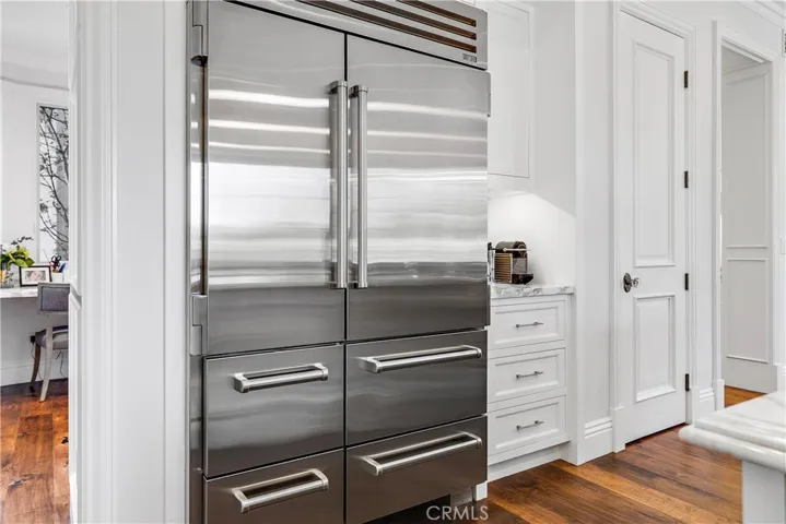 Subzero fridge and walk-in pantry.